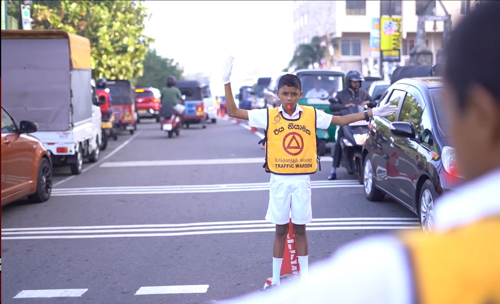 Road Control Unit member directing traffic